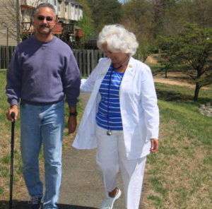 client walking with nurse