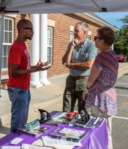 ALZ Table at Open House 2019 ALZ Fundraiser Lori Myers Branch Coordinator for ALZ Enhancing Life Adult Day Center Owner Eric W