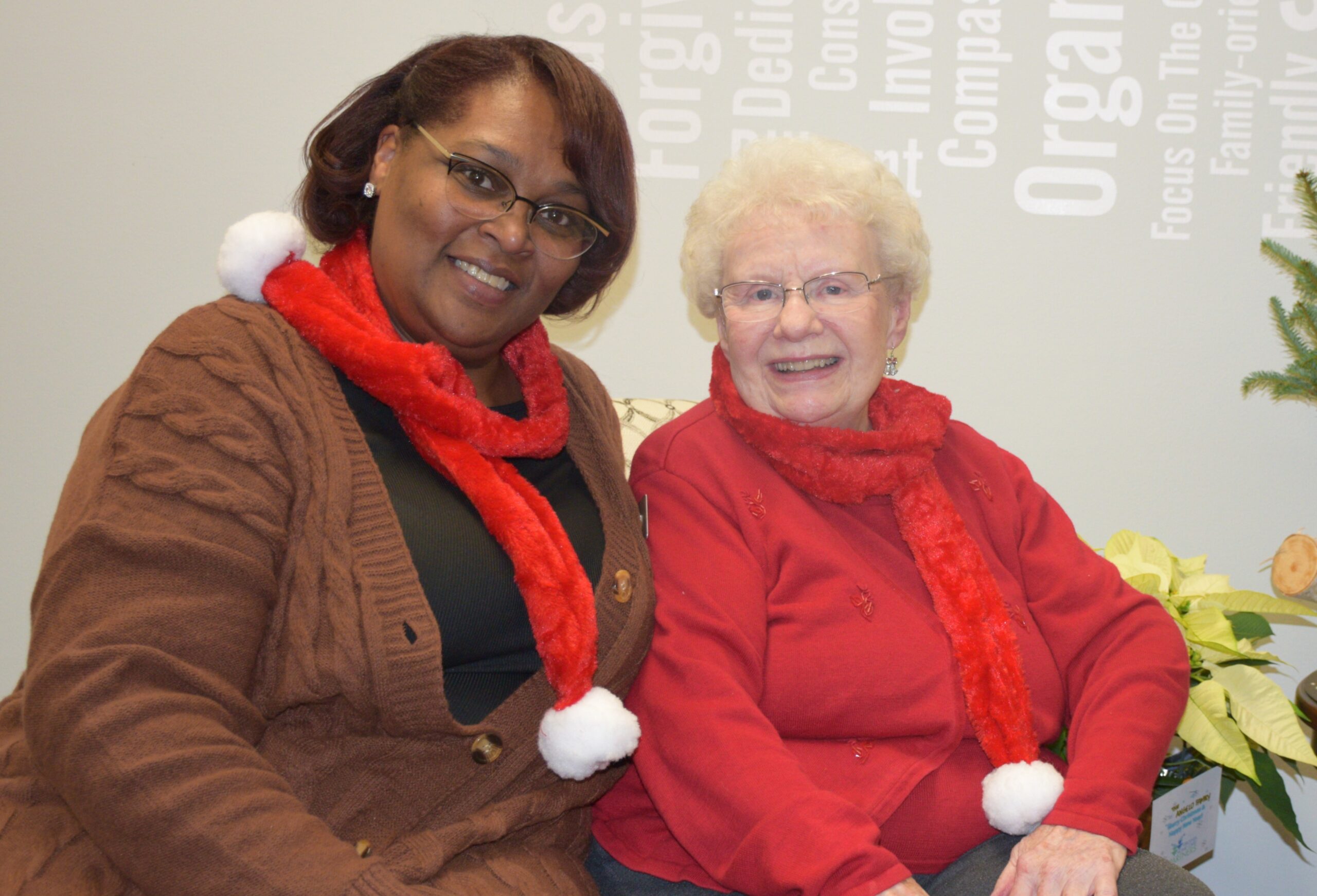 5 (2) care partner handing flowers to client
